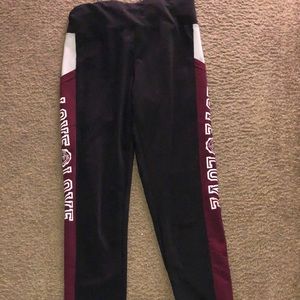 black leggings with burgundy side panels